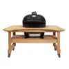 Primo CXLH-600 Extra Large Oval Ceramic Charcoal Kamado Grill On Curved Cypress Table